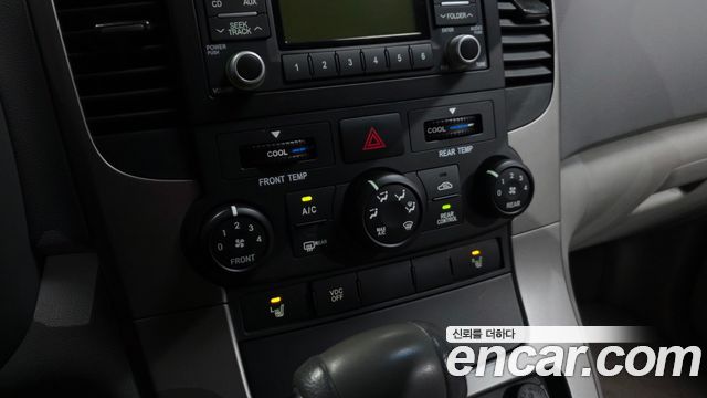 Kia Canival 2010 — photo 16