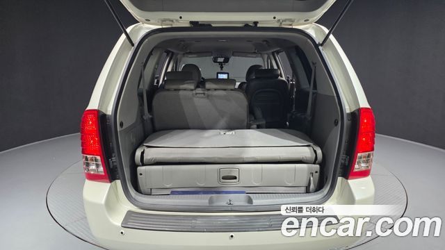 Kia Canival 2010 — photo 20