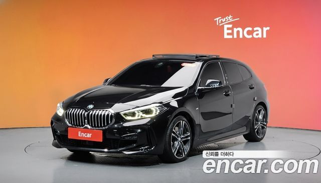 BMW 1-Series 2021 — photo 1