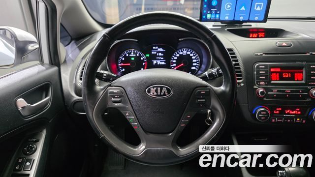 Kia K3 2015 — photo 13