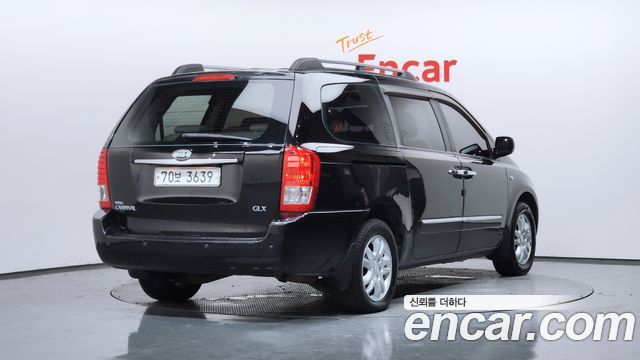 Kia Canival 2008 — photo 2
