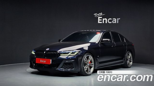 BMW 5-Series 2023 — photo 1
