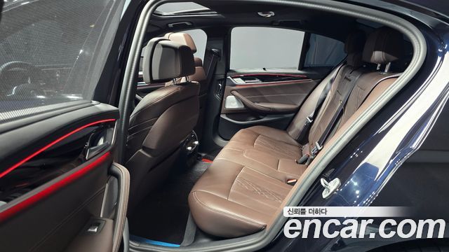 BMW 5-Series 2023 — photo 11