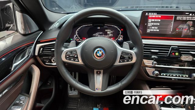 BMW 5-Series 2023 — photo 13