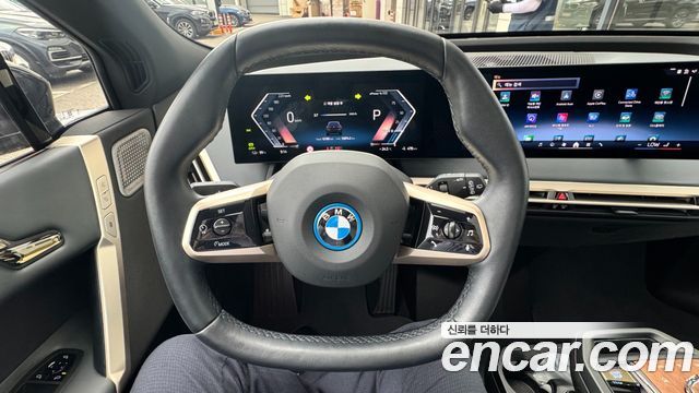 BMW iX 2024 — photo 16