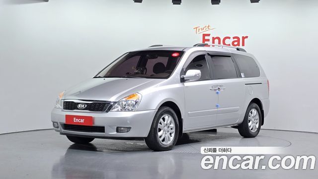 Kia Canival 2013 — photo 1