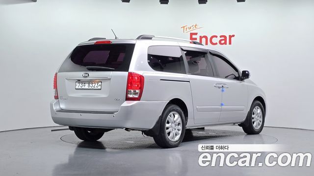 Kia Canival 2013 — photo 2