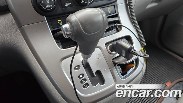 Kia Canival 2013 — photo 9