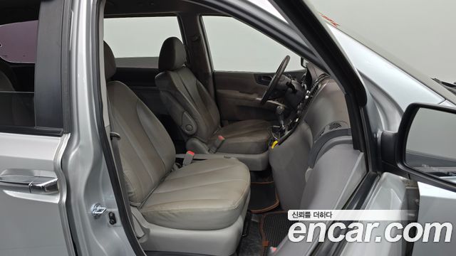 Kia Canival 2013 — photo 12