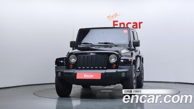 Jeep Wrangler 2011 — photo 3