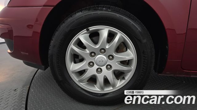 Kia Canival 2011 — photo 5