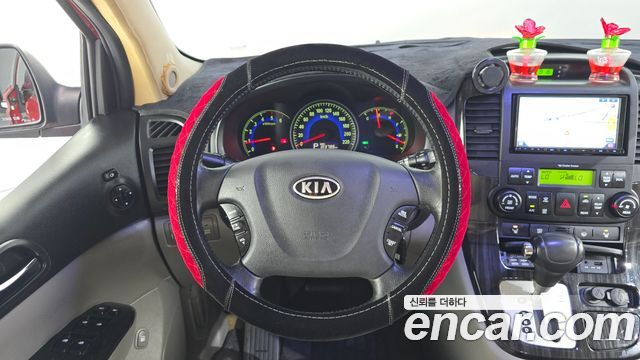 Kia Canival 2011 — photo 21
