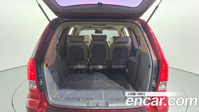 Kia Canival 2011 — photo 25