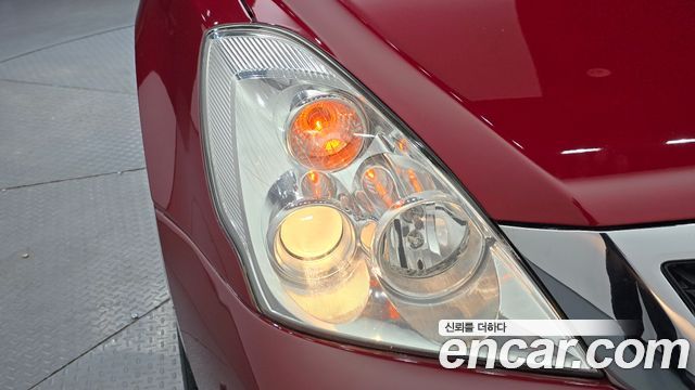 Kia Canival 2011 — photo 8