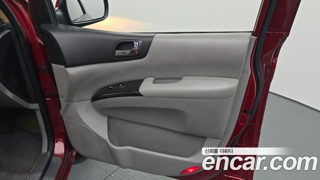 Kia Canival 2011 — photo 15