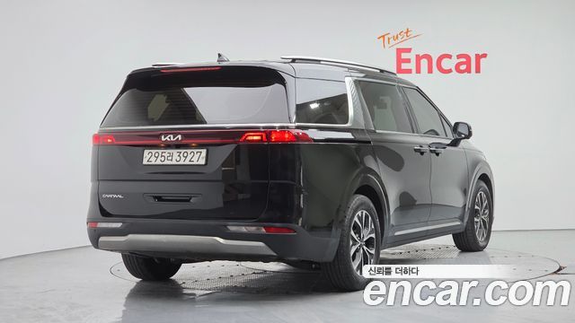 Kia Canival 2023 — photo 2