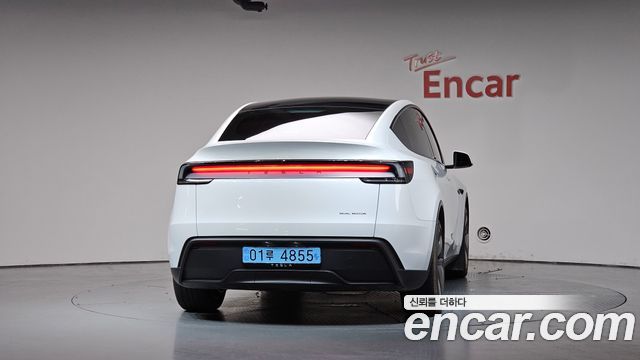Tesla Model Y 2025 — photo 4
