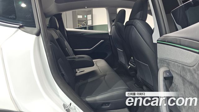 Tesla Model Y 2025 — photo 17