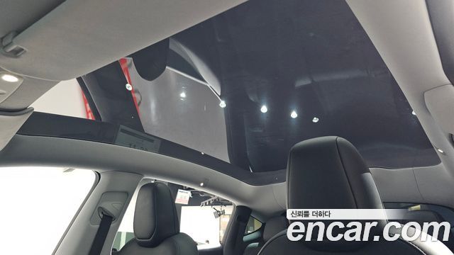 Tesla Model Y 2025 — photo 33