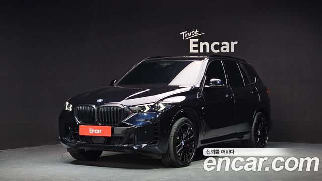 BMW X5 2024 — photo 1