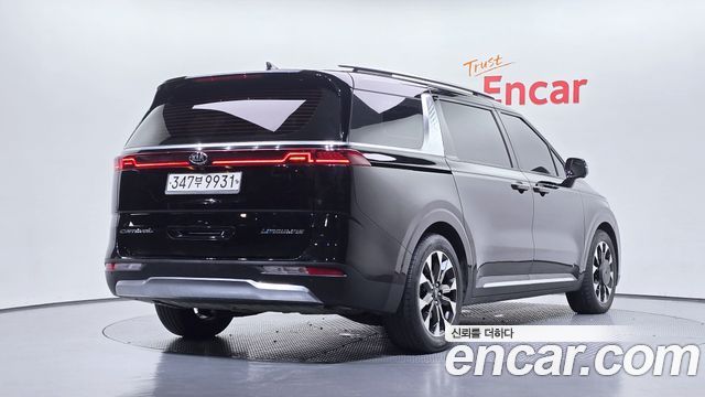 Kia Canival 2021 — photo 2