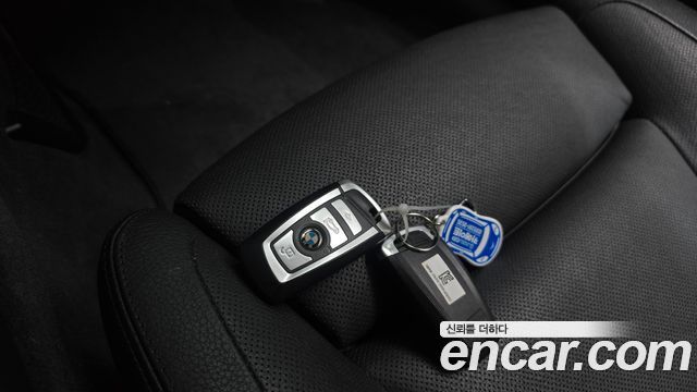 BMW 7-Series 2014 — photo 17
