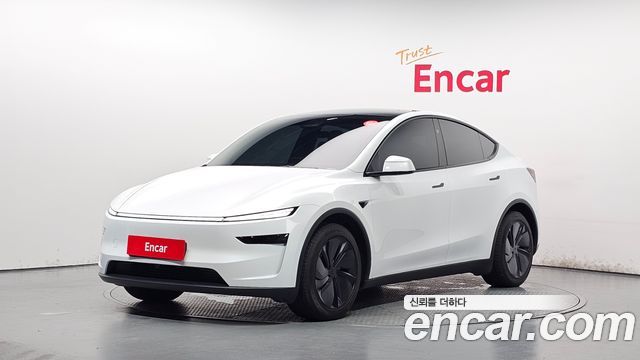 Tesla Model Y 2025 — photo 1