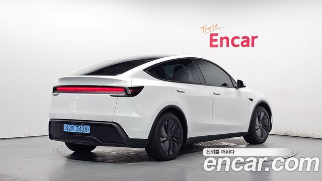 Tesla Model Y 2025 — photo 3