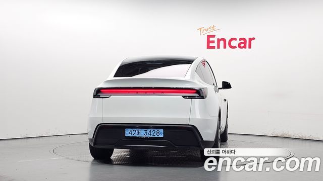 Tesla Model Y 2025 — photo 4