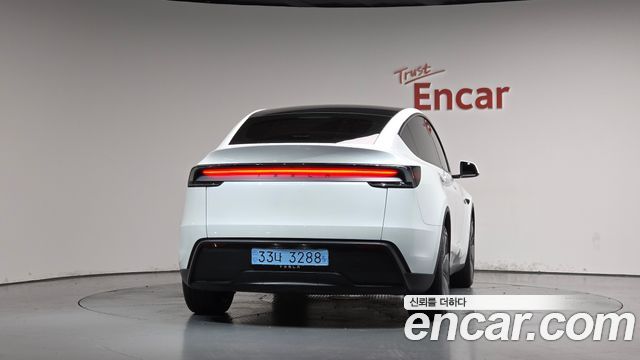 Tesla Model Y 2025 — photo 4