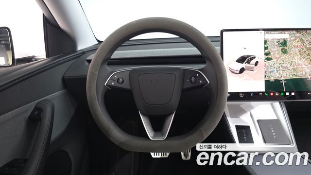 Tesla Model Y 2025 — photo 18