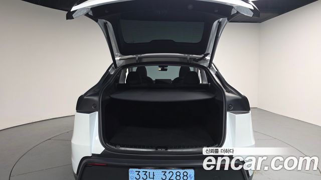 Tesla Model Y 2025 — photo 26