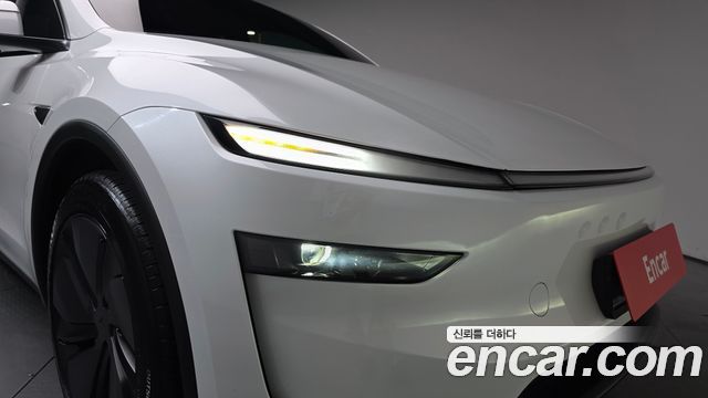 Tesla Model Y 2025 — photo 8