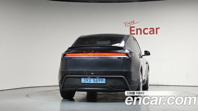 Tesla Model Y 2025 — photo 4