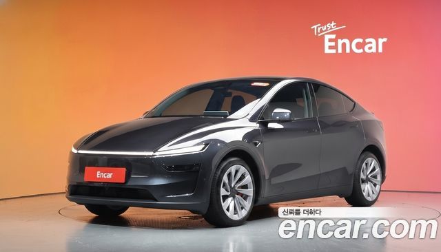 Tesla Model Y 2025 — photo 1