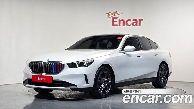 BMW 5-Series 2024 — photo 1