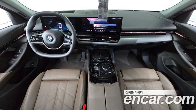 BMW 5-Series 2024 — photo 10