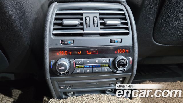 BMW 7-Series 2012 — photo 18