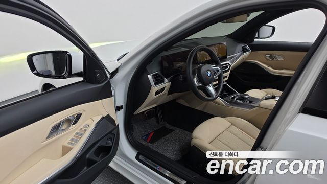 BMW 3-Series 2024 — photo 13