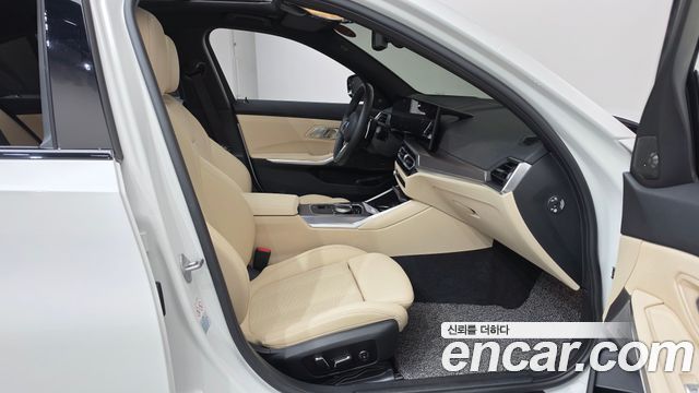 BMW 3-Series 2024 — photo 16
