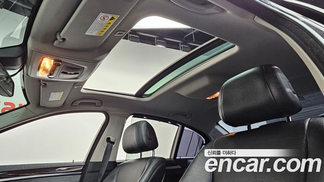 BMW 5-Series 2014 — photo 19