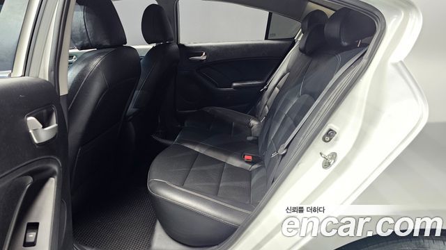 Kia K3 2013 — photo 18
