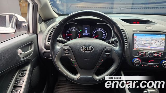 Kia K3 2013 — photo 19