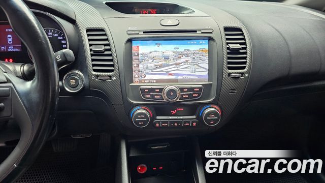 Kia K3 2013 — photo 20
