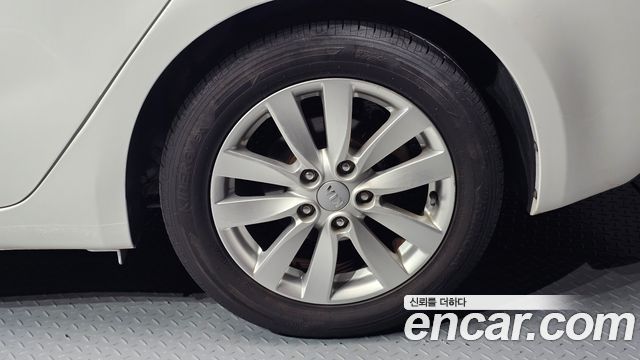 Kia K3 2013 — photo 7