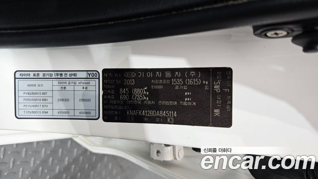 Kia K3 2013 — photo 29