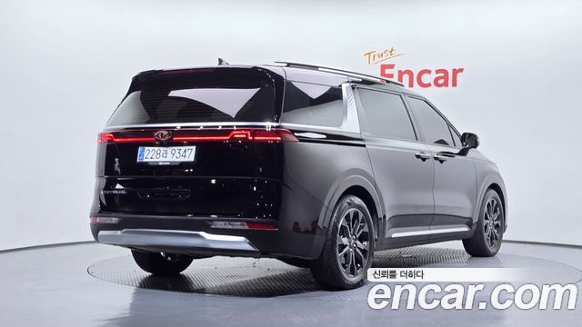 Kia Canival 2021 — photo 2
