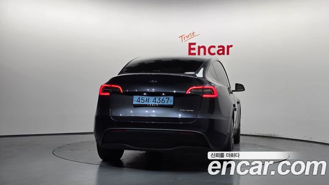 Tesla Model Y 2024 — photo 4