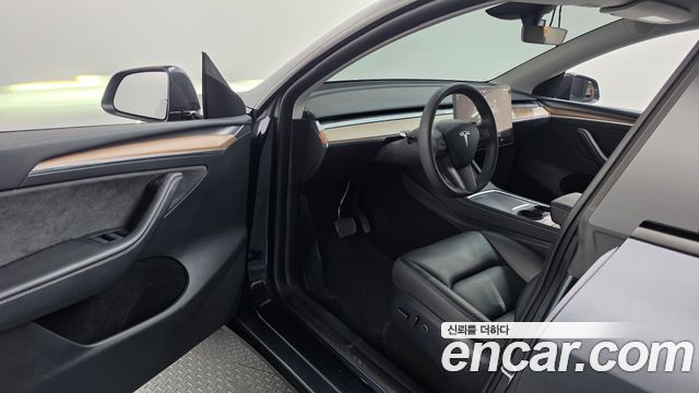 Tesla Model Y 2024 — photo 13