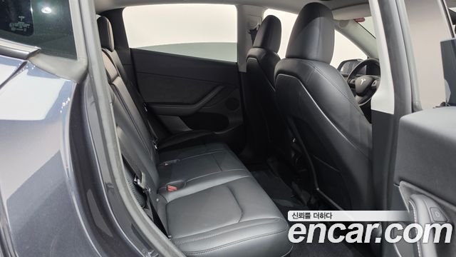Tesla Model Y 2024 — photo 17